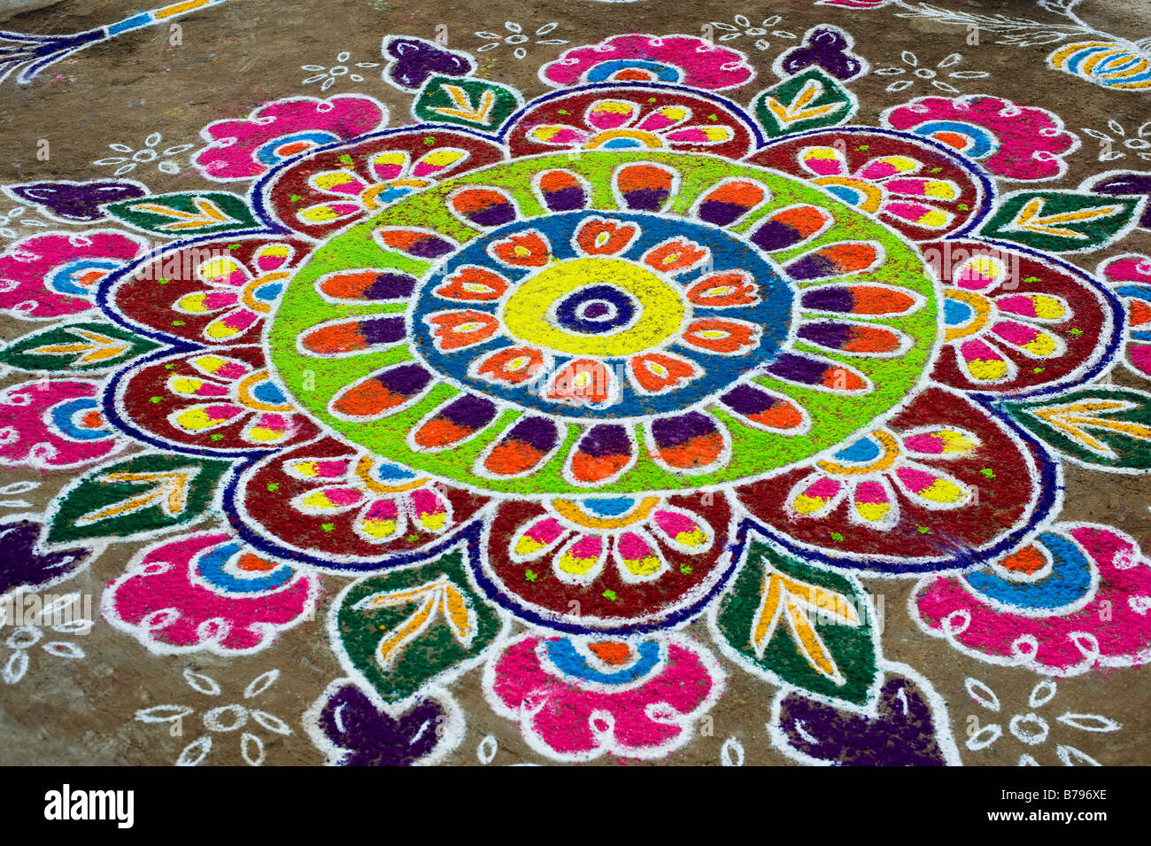 Rangoli festival designs in an Indian street made at the hindu festival of Sankranti or Pongal. Andhra Pradesh, India Stock Photo