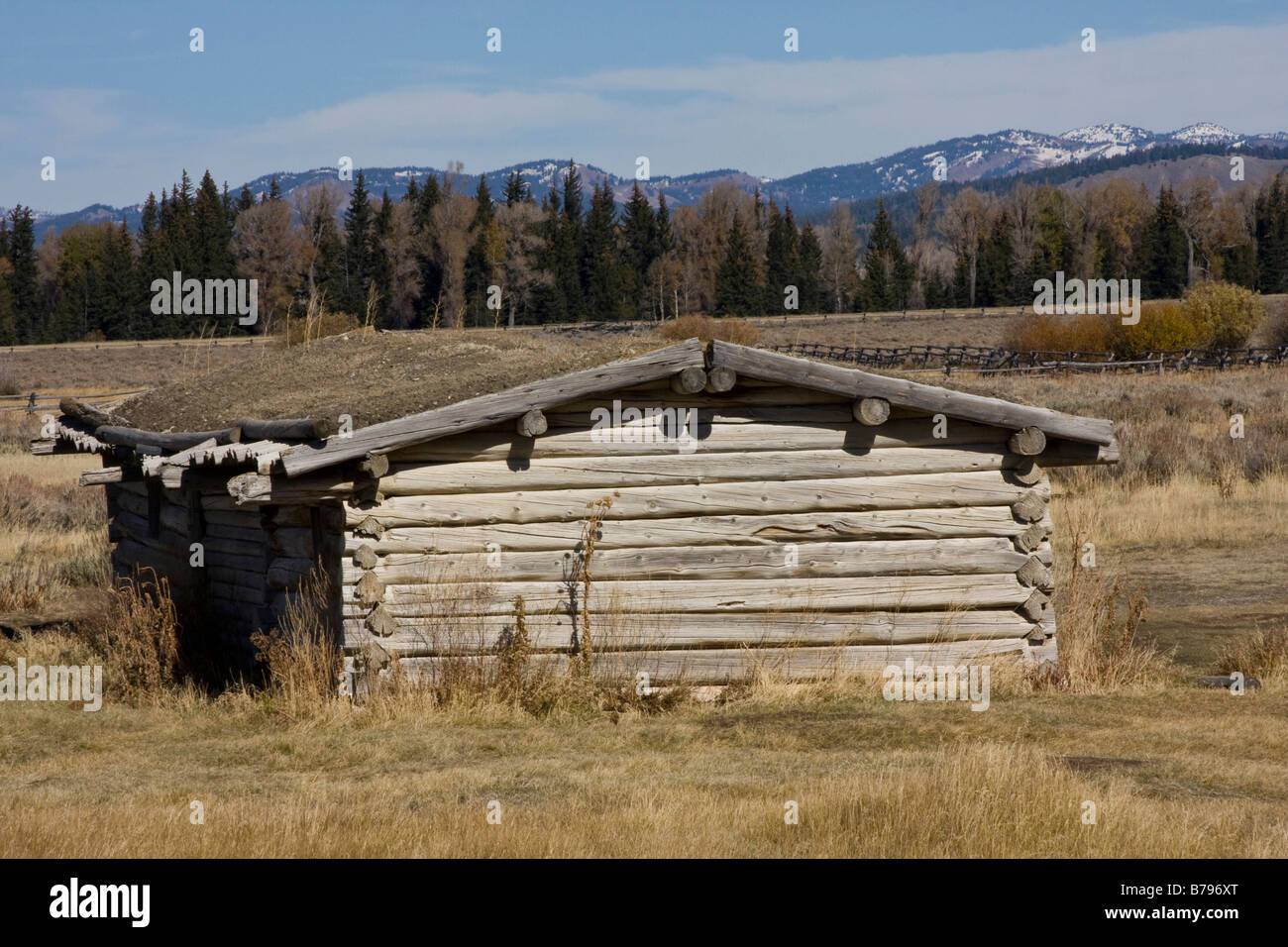 Cunningham Cabin stands in front of the Tetons in Jackson Hole, Wyoming. Stock Photo