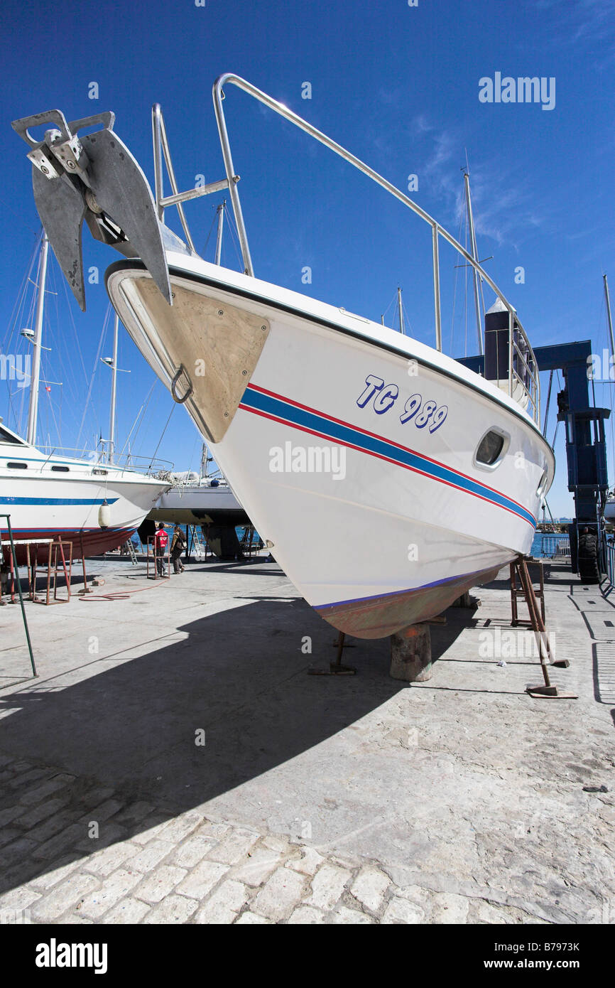 A boat in dry dock. Port el Kantaoui, Tunisia. Stock Photo