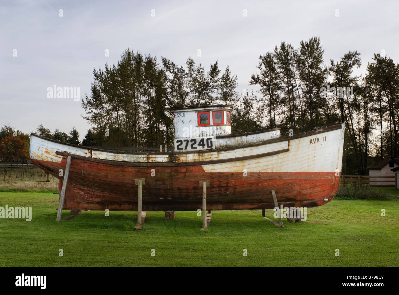 Old fishing boat in field South Surrey British Columbia Canada Stock Photo