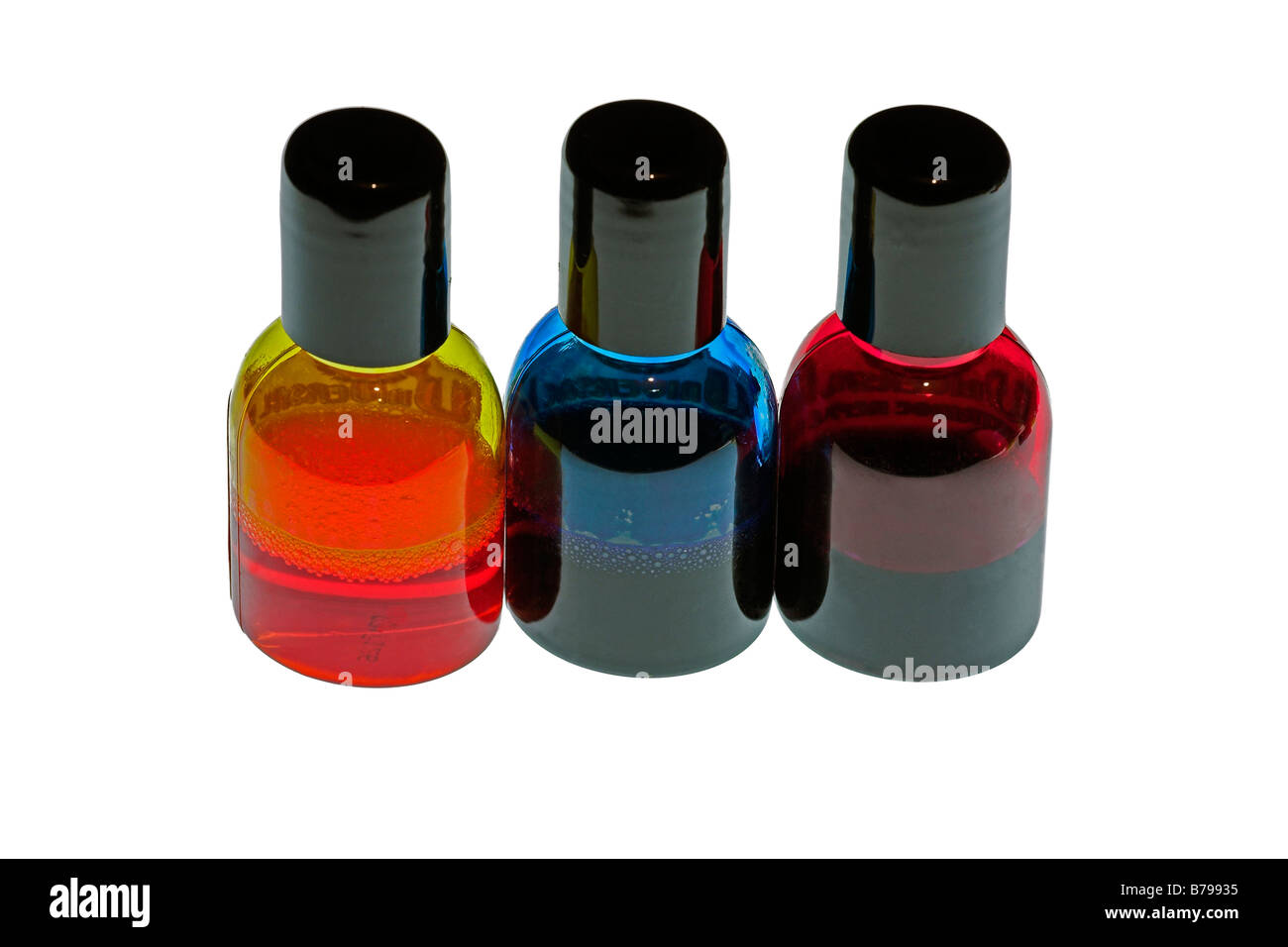 Three bottles with yellow, cyan, magenta ink, isolated Stock Photo - Alamy