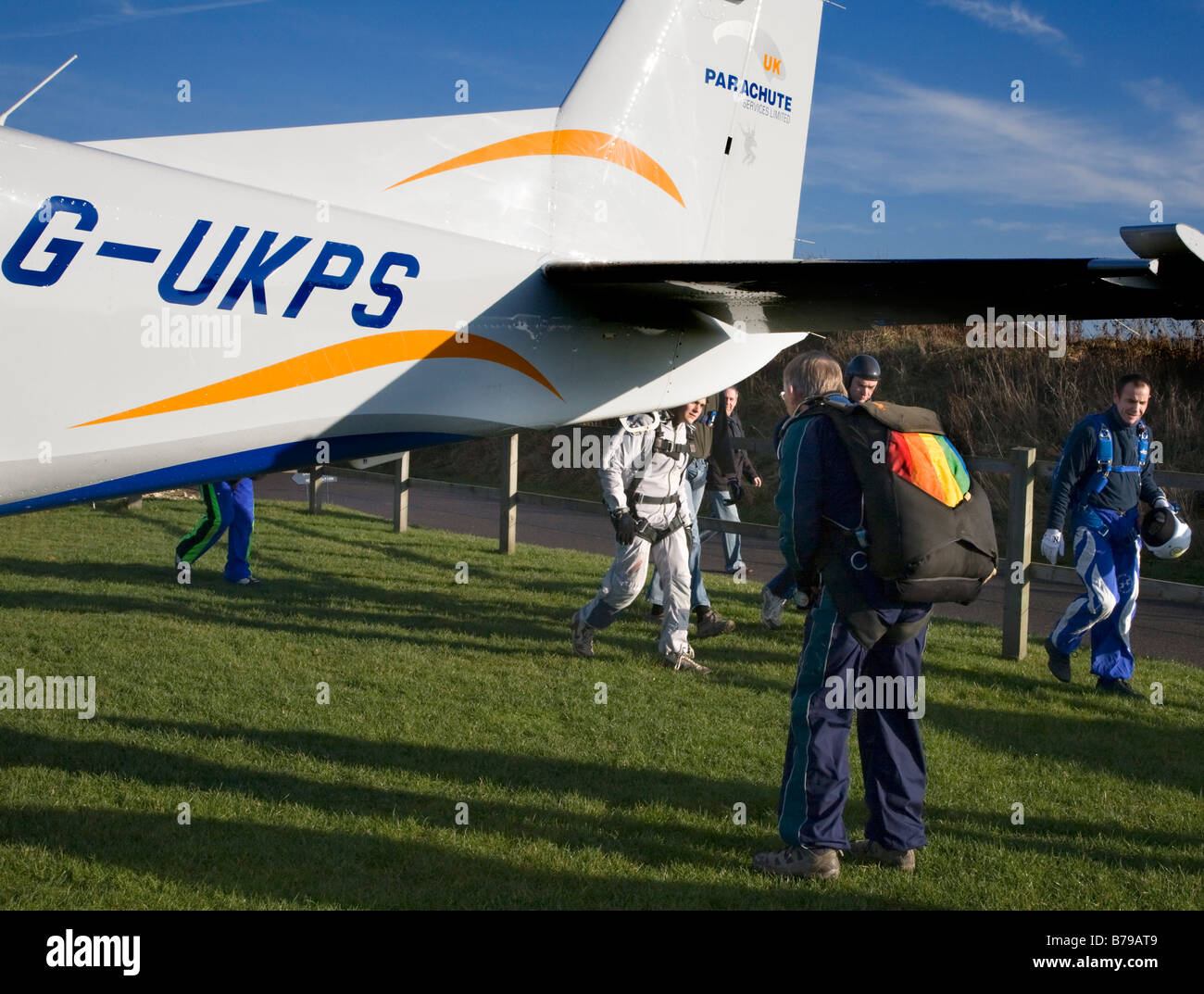 Cessna Caravan turbine aircraft USED TO CARRY SKYDIVERS. THE PARACHUTISTS GET READY TO BOARD THE AIRCRAFT Stock Photo