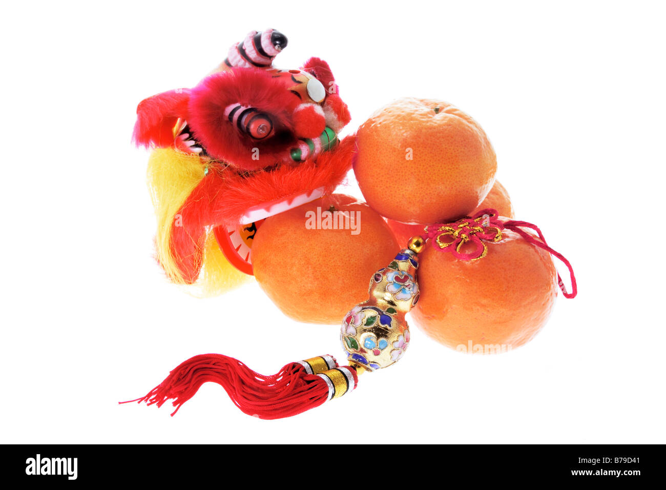 Mandarins and Chinese New Year Decorations Stock Photo