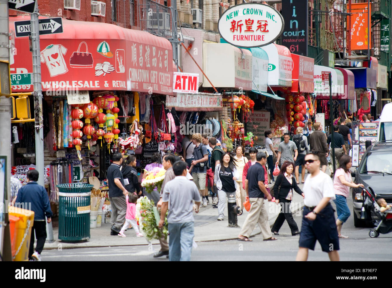Pedestrians walk on street in Chinatown New York City Stock Photo Alamy
