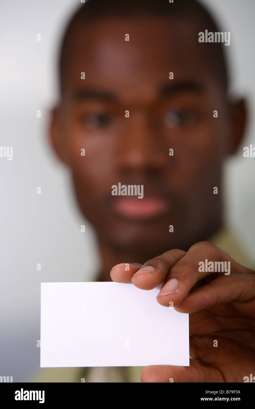 confident businessman with business card Stock Photo