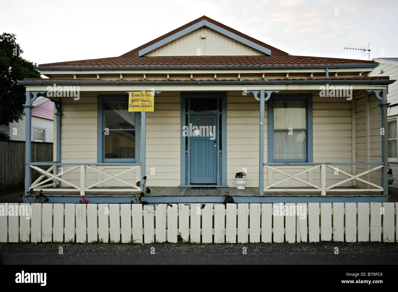 Urban landscape Palmerston North New Zealand Detahced wooden house with room for rent sign 100 per week Stock Photo