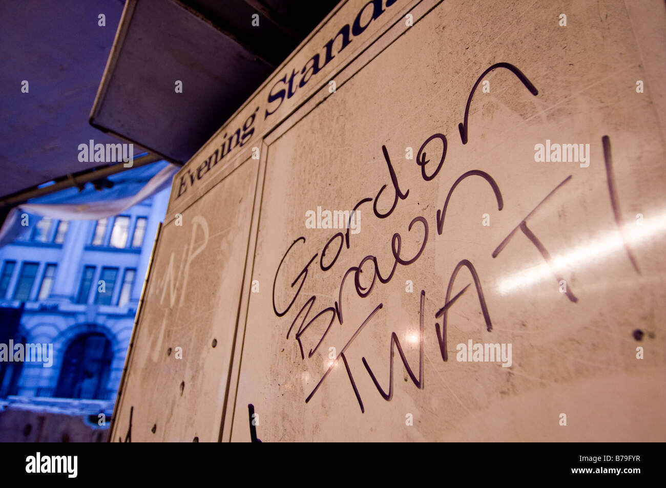 An Evening Standard lock-up covered with grafitti Stock Photo