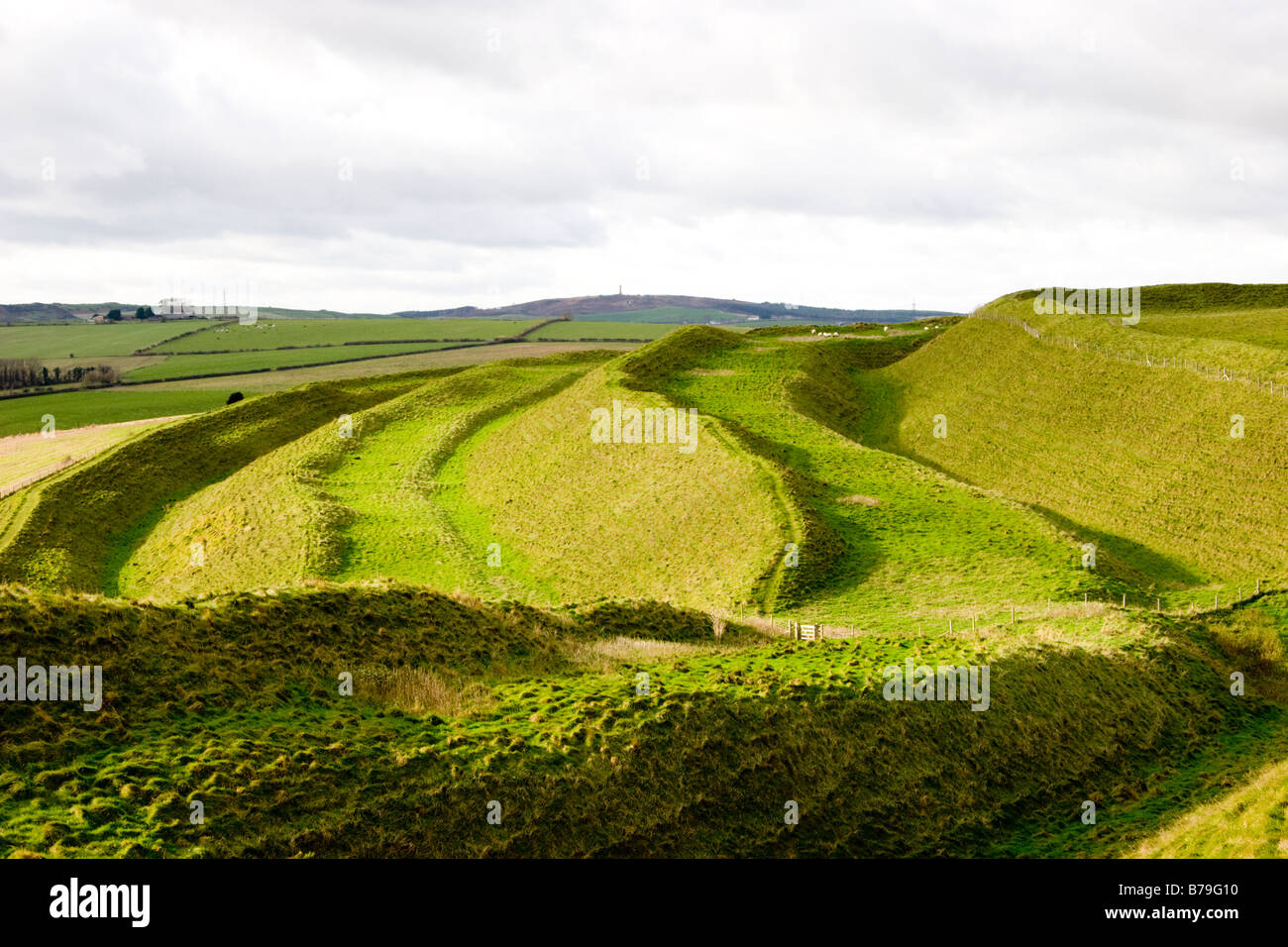 Iron Age hill fort Maiden Castle Dorchester England Stock Photo