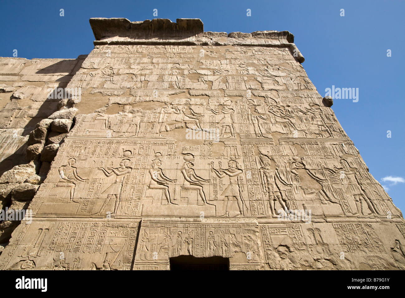 Relief work on the outer walls at the Temple of Khnum at Esna, Egypt Stock Photo