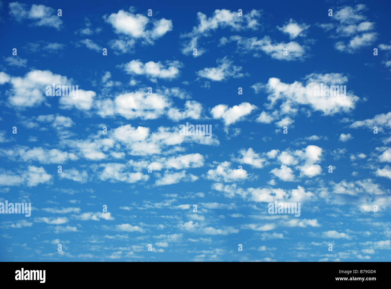 Blue sky and many small clouds Stock Photo