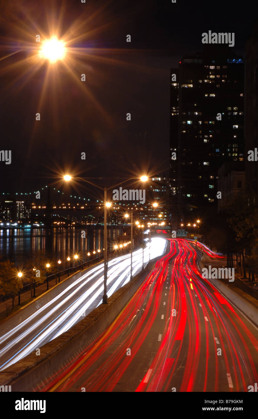 Blurred traffic at night on FDR Drive in New York City New York USA Stock Photo