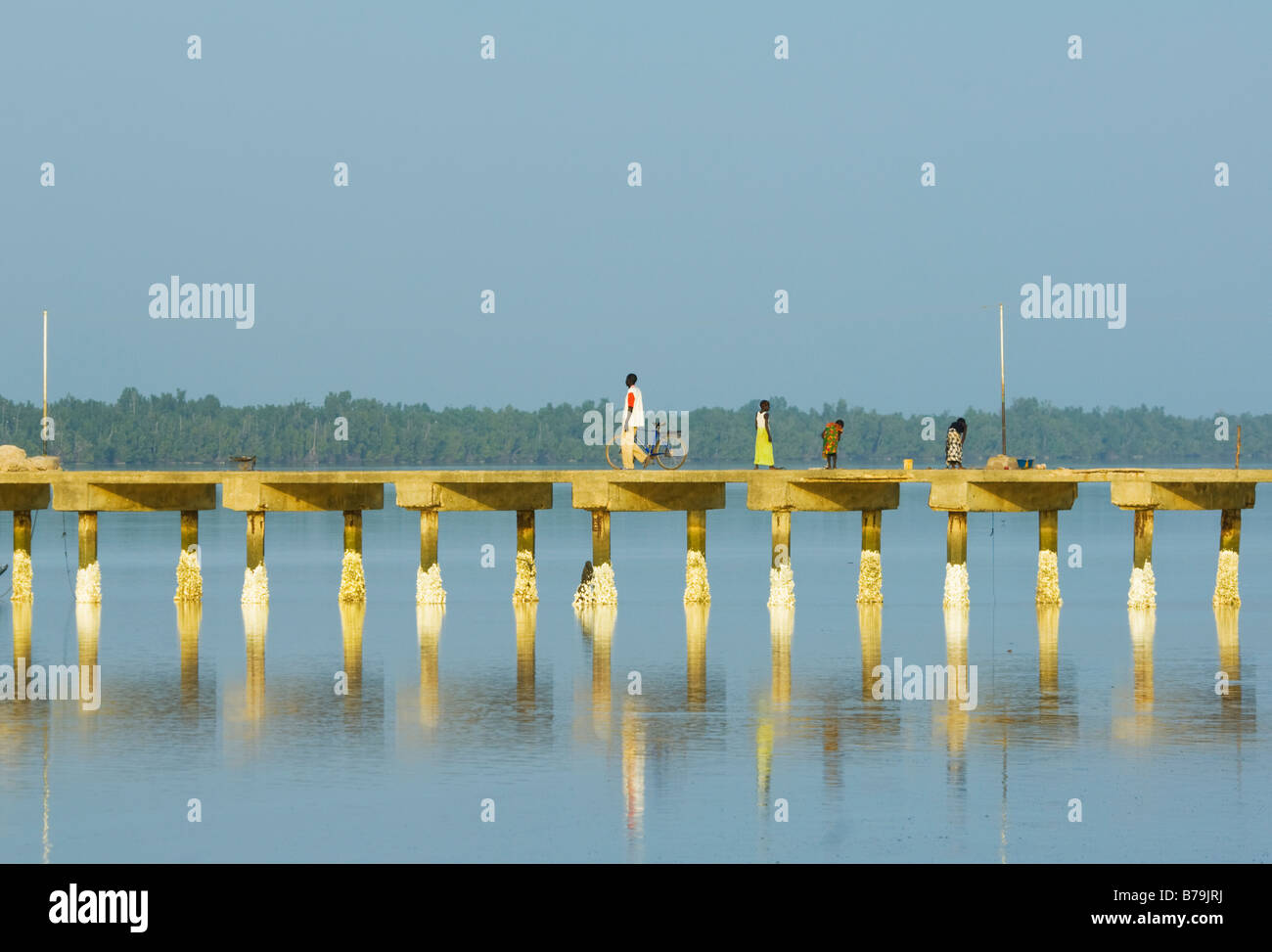 People on Jetty Tendaba Camp The Gambia Stock Photo