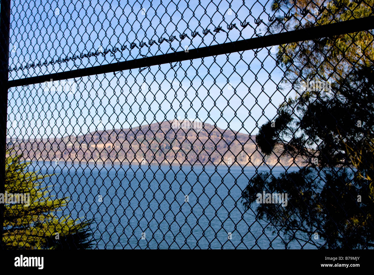 View through fence from inside Alcatraz prison San Francisco USA Stock Photo
