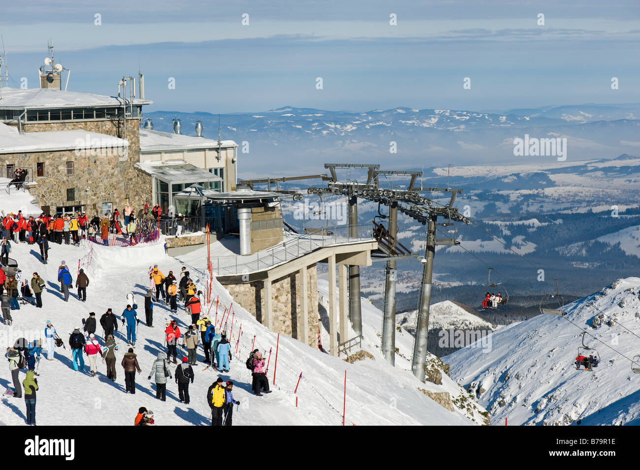 Holidaymakers enjoy winter sports on slopes of Kasprowy Wierch Zakopane Tatra Mountains Podhale Region Poland Stock Photo