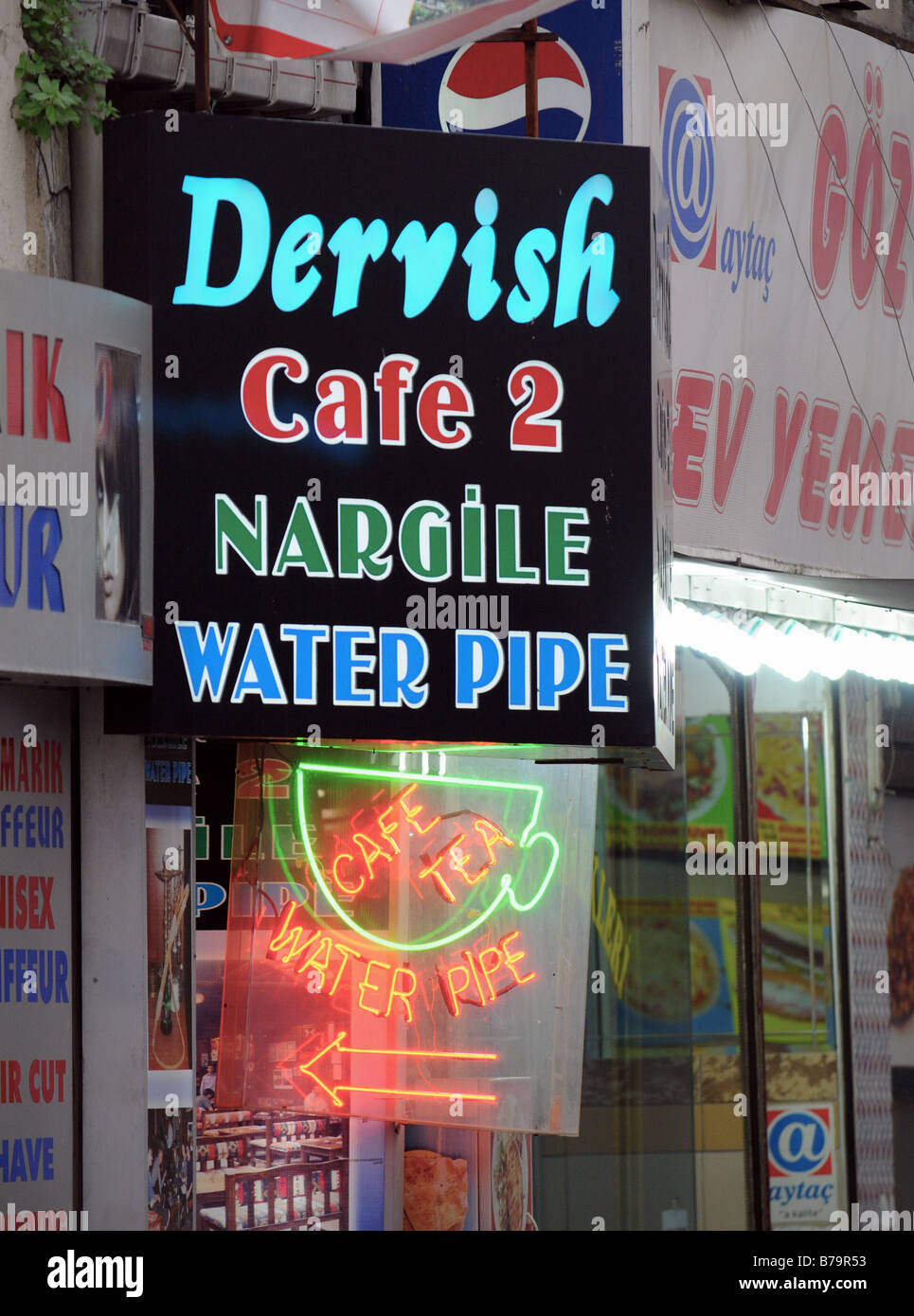 Bright sign for a cafe 'Dervish', offering tea and water pipes (Nargile/Shisha) in Sultanahmet, Istanbul, Turkey. Stock Photo