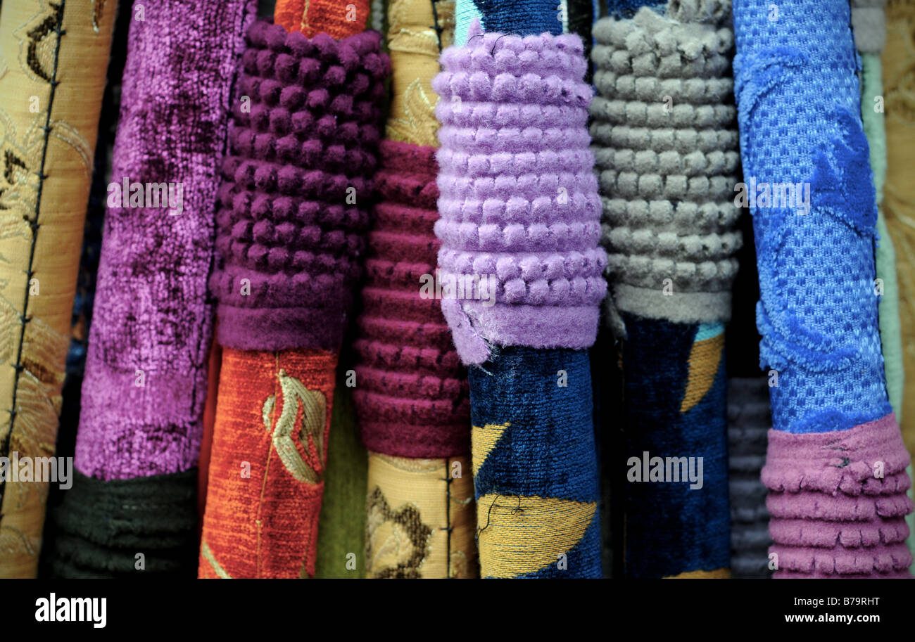 A colourful selection of fabric hoses/pipes for a Nargile/Shisha (Water Pipe) hanging for sale in a market in Istanbul, Turkey. Stock Photo