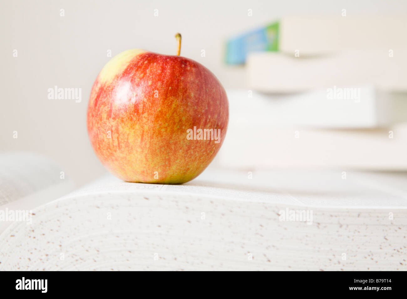 Books and apple Stock Photo