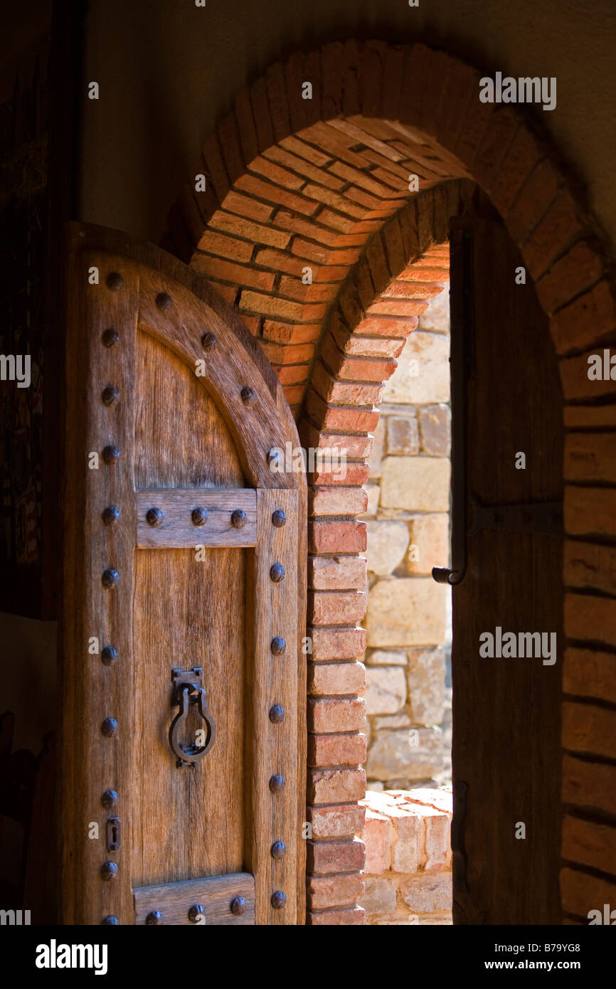 WOODEN DOOR in CASTELLO DI AMAROSA a WINERY housed in an CASTLE located near CALISTOGA NAPA VALLEY CALIFORNIA Stock Photo