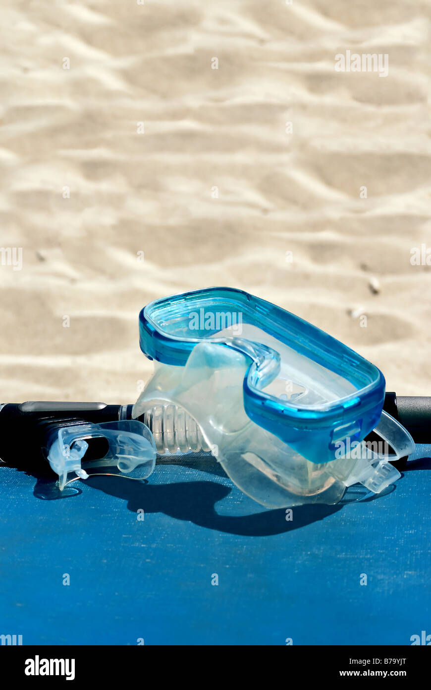 Scuba mask with sand Stock Photo