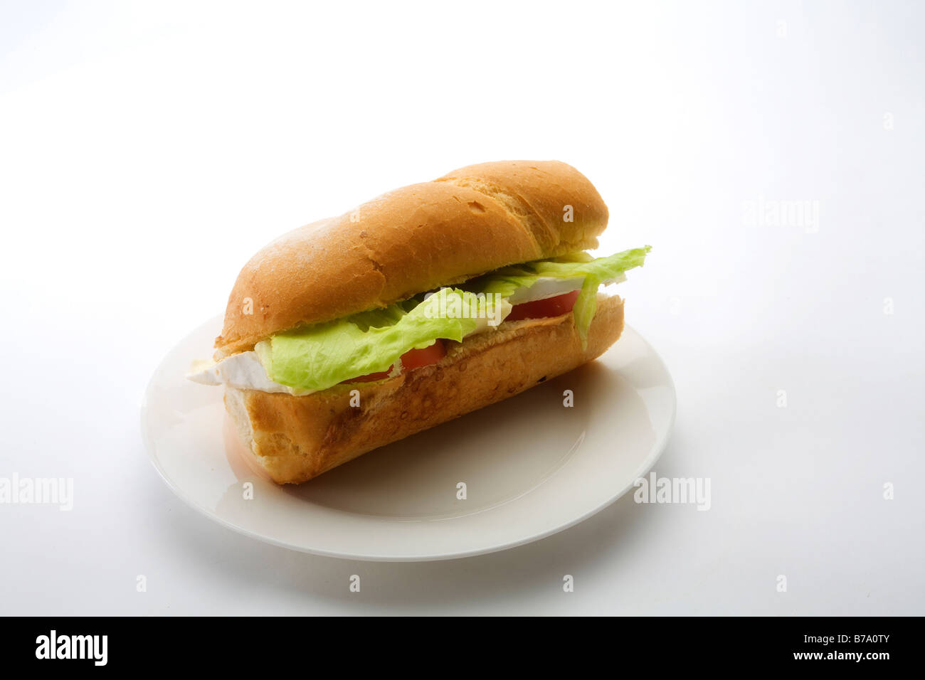 A brie lettuce and tomato baguette Stock Photo Alamy
