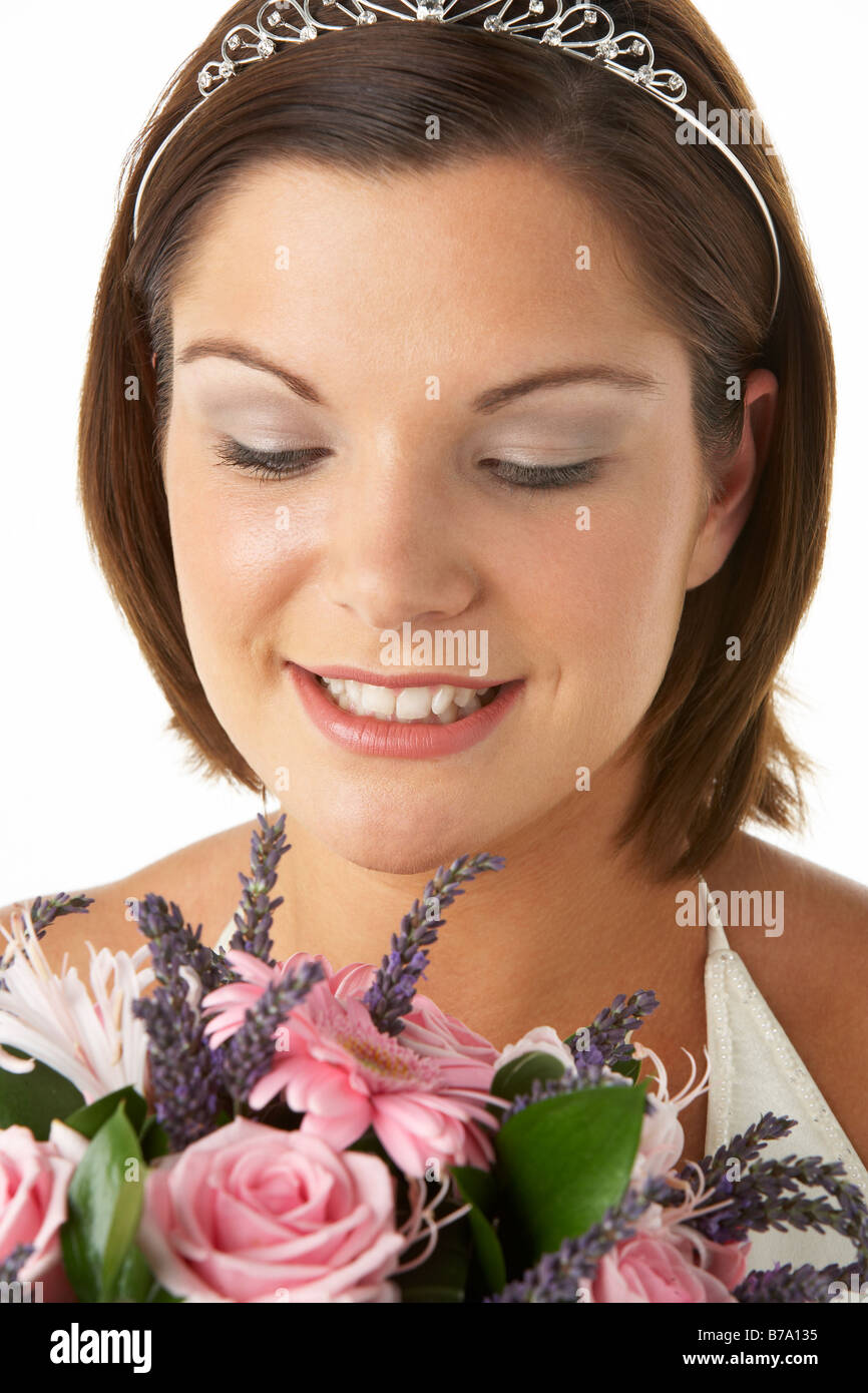 Bride holding bouquet smiling hi-res stock photography and images - Alamy