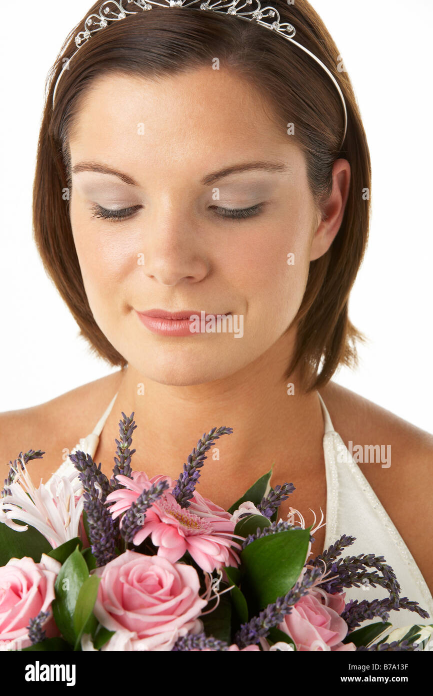 Portrait Of Bride Holding Bouquet Of Flowers Stock Photo - Alamy