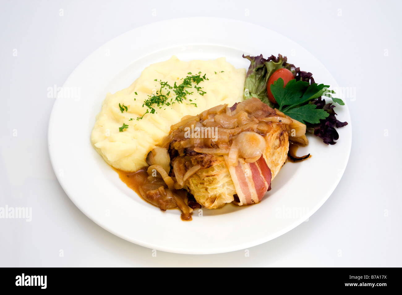 Savoy cabbage roulade with minced meat stuffing, onion sauce, slice of ...