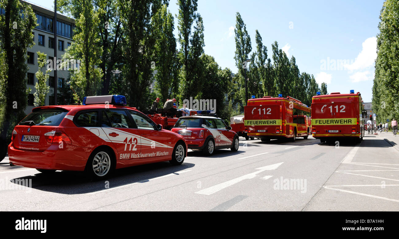 Fire brigade, modern cars, Leopoldstrasse Street, Munich, Bavaria, Germany, Europe Stock Photo