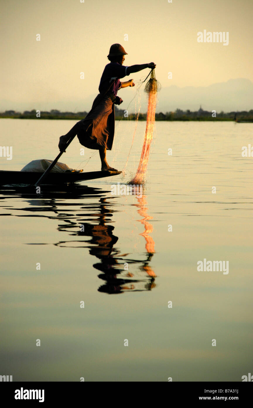 Fisherman rowing boat hi-res stock photography and images - Alamy