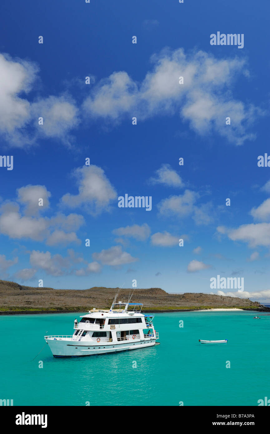 Boat in the snorkling paradise in the bay of Santa Fé Island, Galapagos Islands, Ecuador, South America Stock Photo