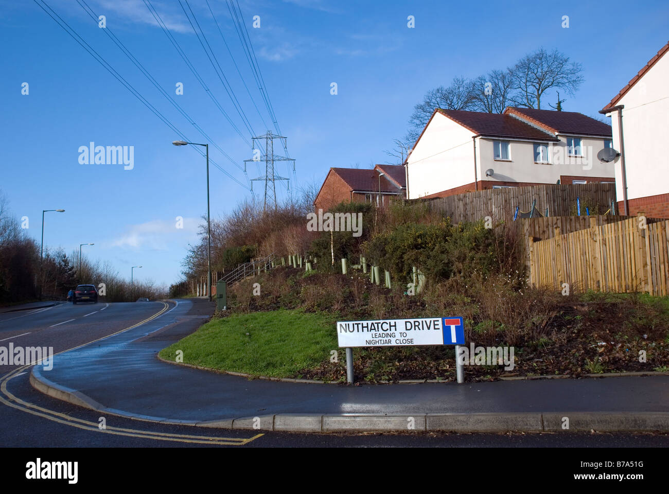 New housing development built under electricity pylons Stock Photo Alamy