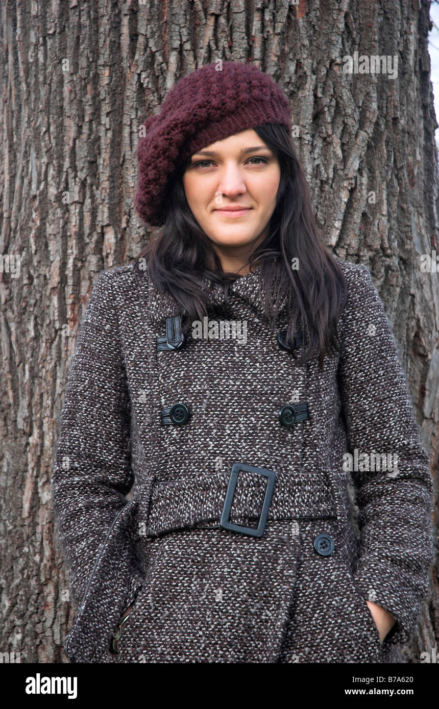 Portrait of a young woman outdoors wearing woollen hat Stock Photo - Alamy