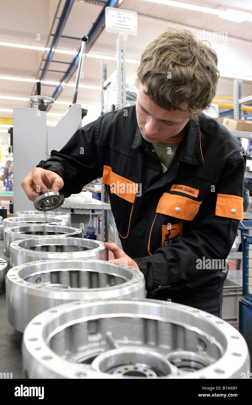 Mechatronics apprentice at the Robot production in the KUKA Roboter GmbH, responsible for the robotics department of the IWKA A Stock Photo