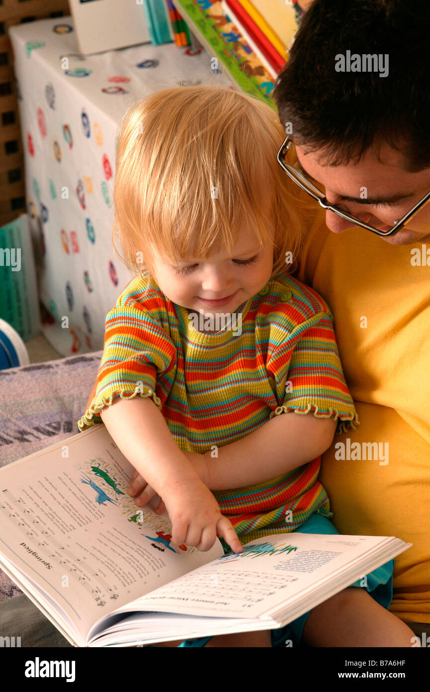 Father reading to his child Stock Photo