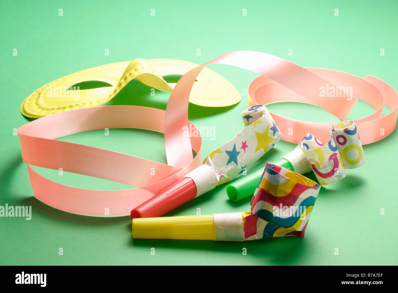 Blowers and party mask Stock Photo - Alamy