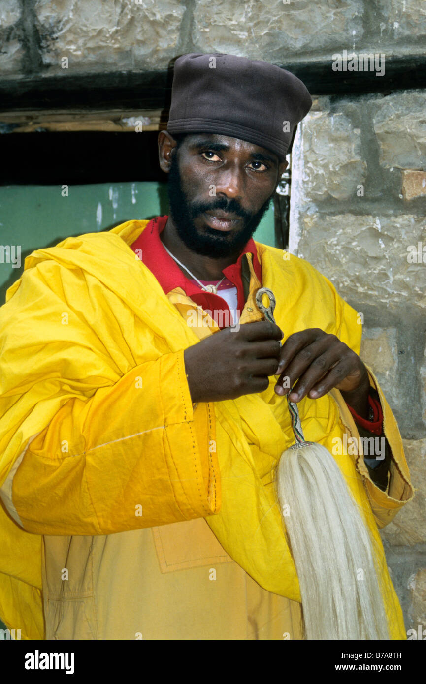 Yellow black robe hi-res stock photography and images - Alamy