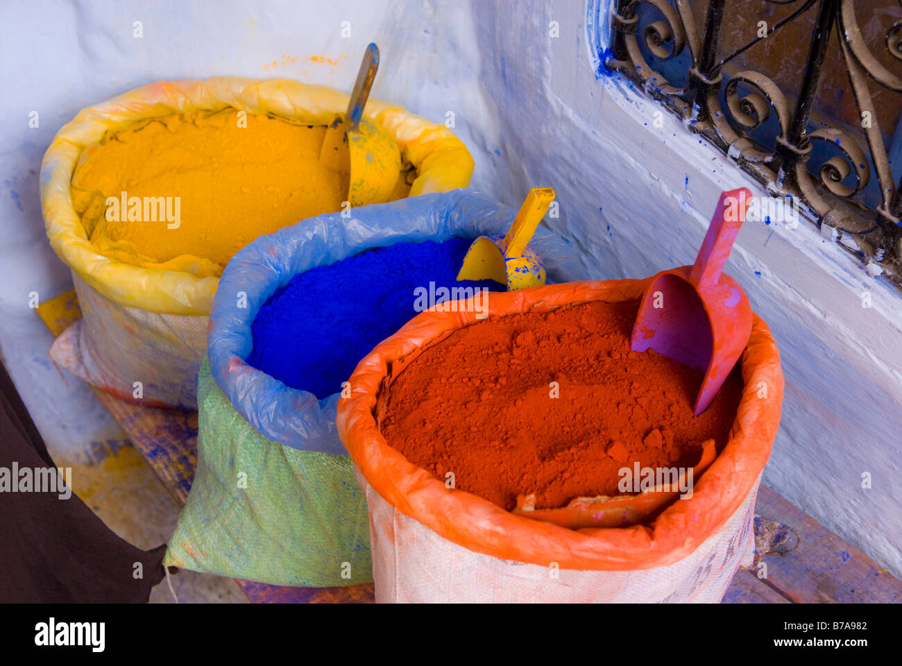 Dyers on street bench in Chefchaouen, Morocco, Africa Stock Photo