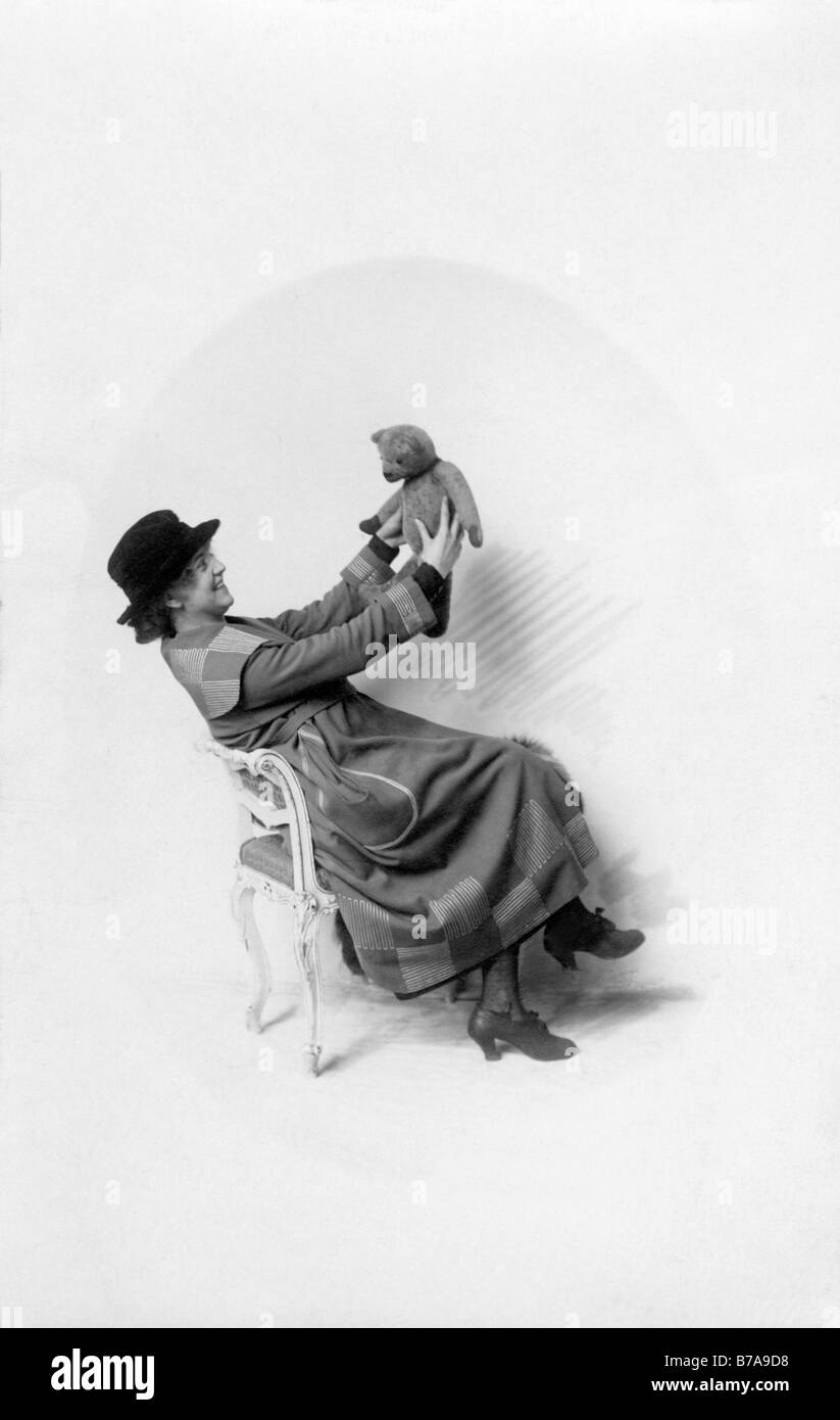 Historic photo, woman with teddybear, ca. 1920 Stock Photo