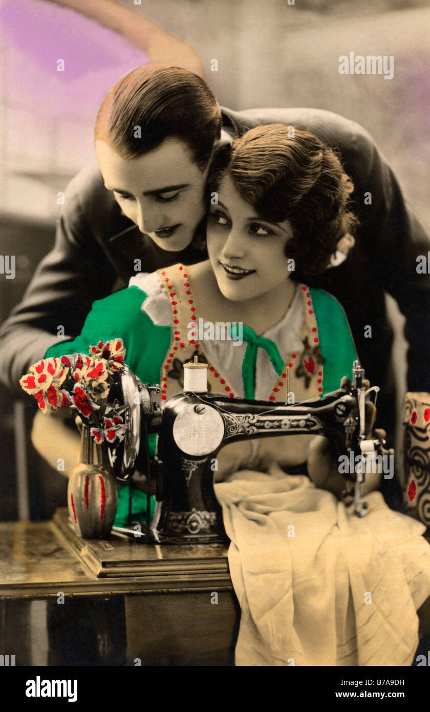 Historic photo, couple with sewing machine, ca. 1920 Stock Photo