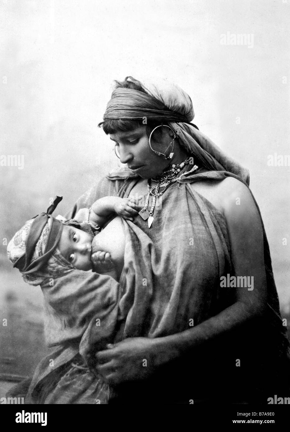 Historic photo, Bedouin woman with baby, Egypt, ca. 1870 Stock Photo