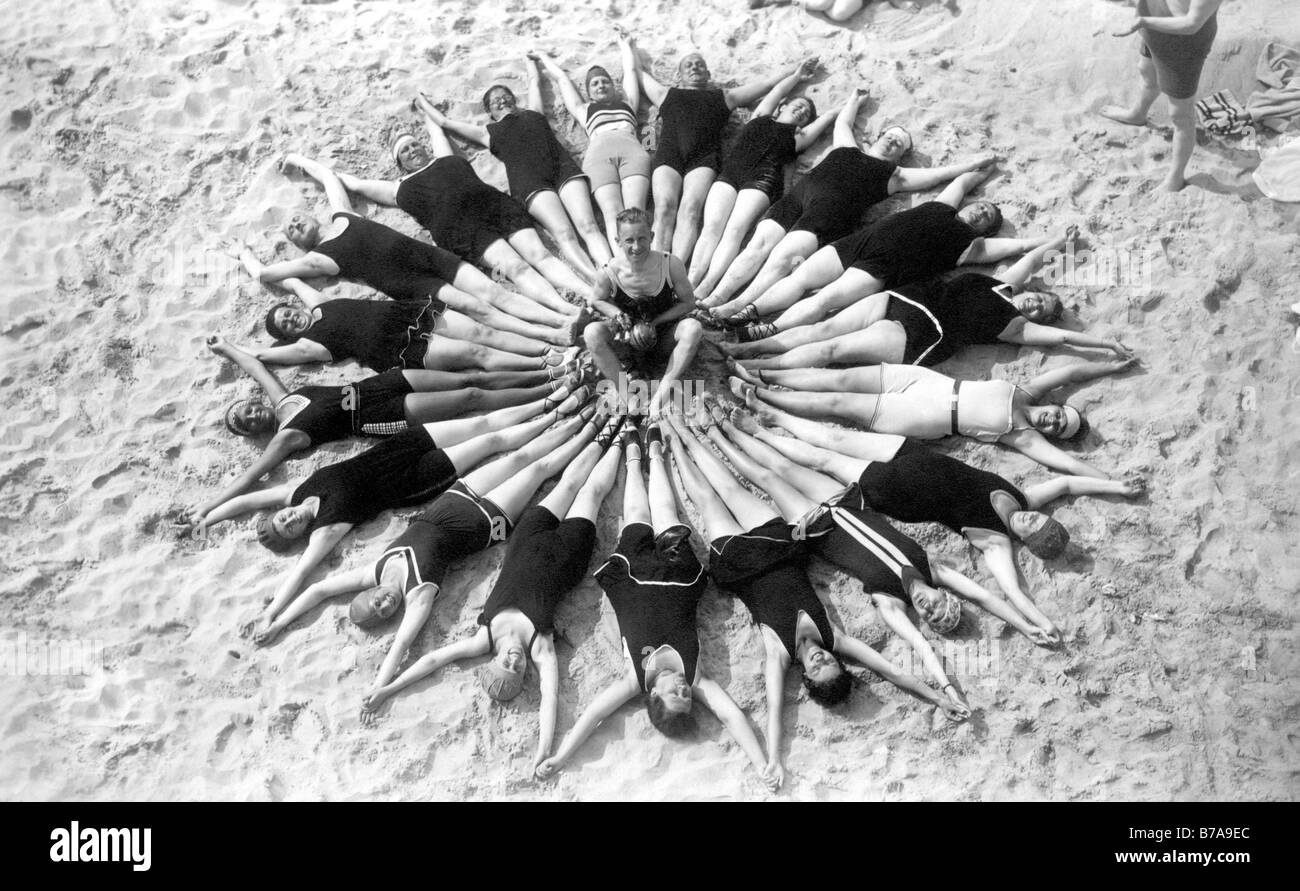 Historic photo, group of bathers forming a circle, ca. 1920 Stock Photo