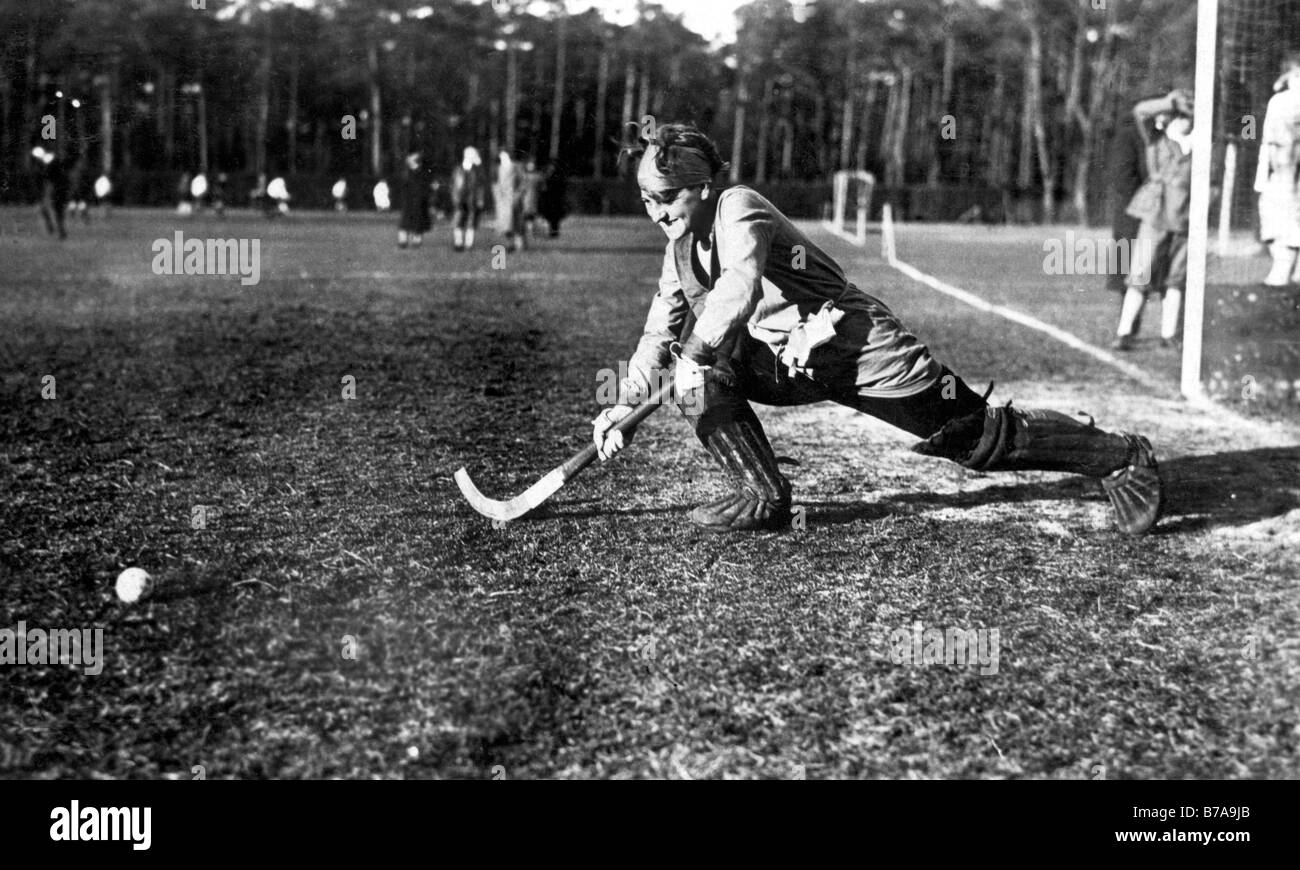 Historic photo, woman playing hockey, ca. 1925 Stock Photo