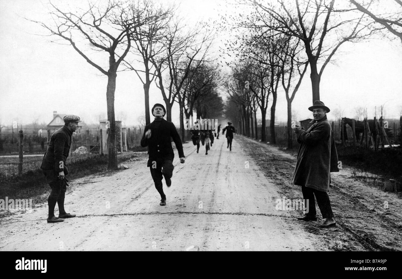 Historic photo, marathon runner arriving at the finish line, ca. 1910 Stock Photo