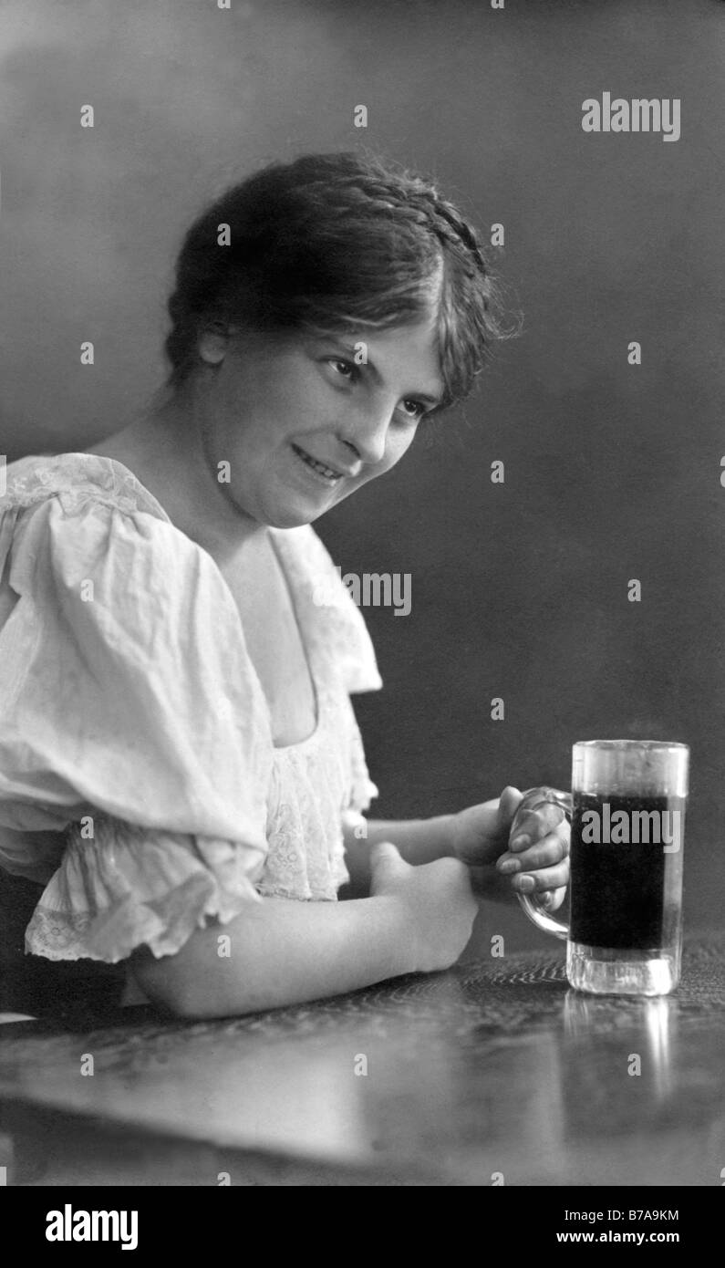 Historic photo, woman with beer glass, ca. 1920 Stock Photo