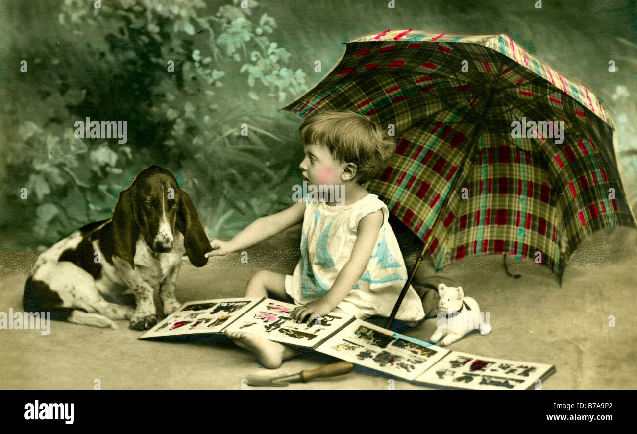 Historic photo, child with his dog, ca. 1910 Stock Photo