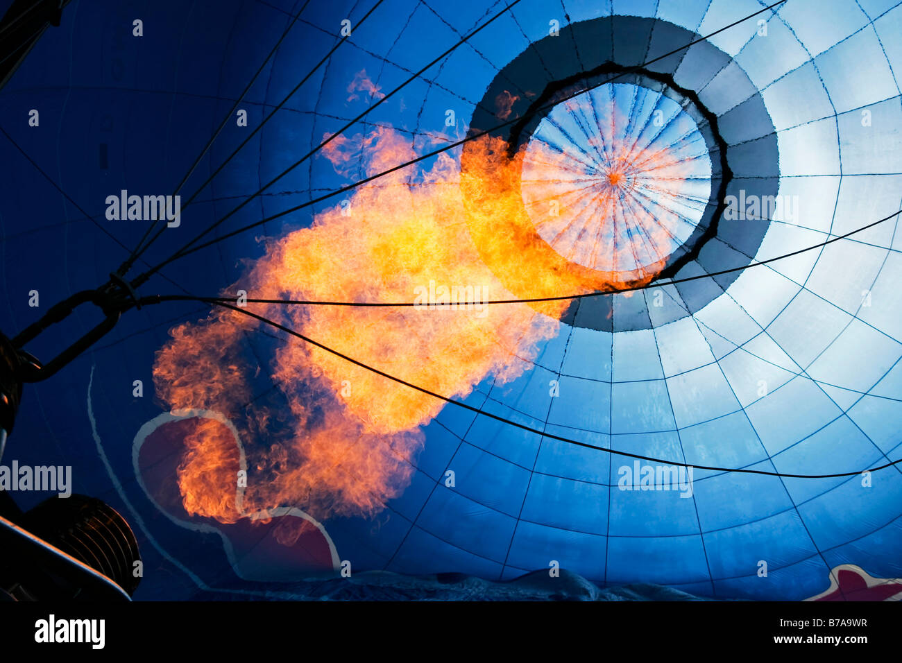 Hot air balloon being heated with a flame, Montgolfiade Bad Wiessee, Tegernsee, Bavaria, Germany, Europe Stock Photo