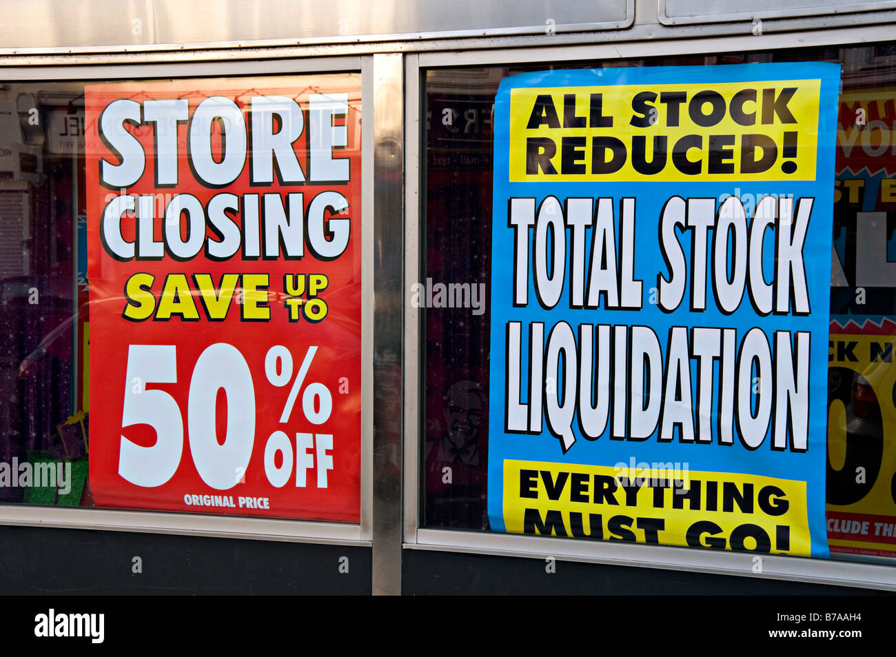 Stock liquidation posters in store window, Londond, UK Stock Photo