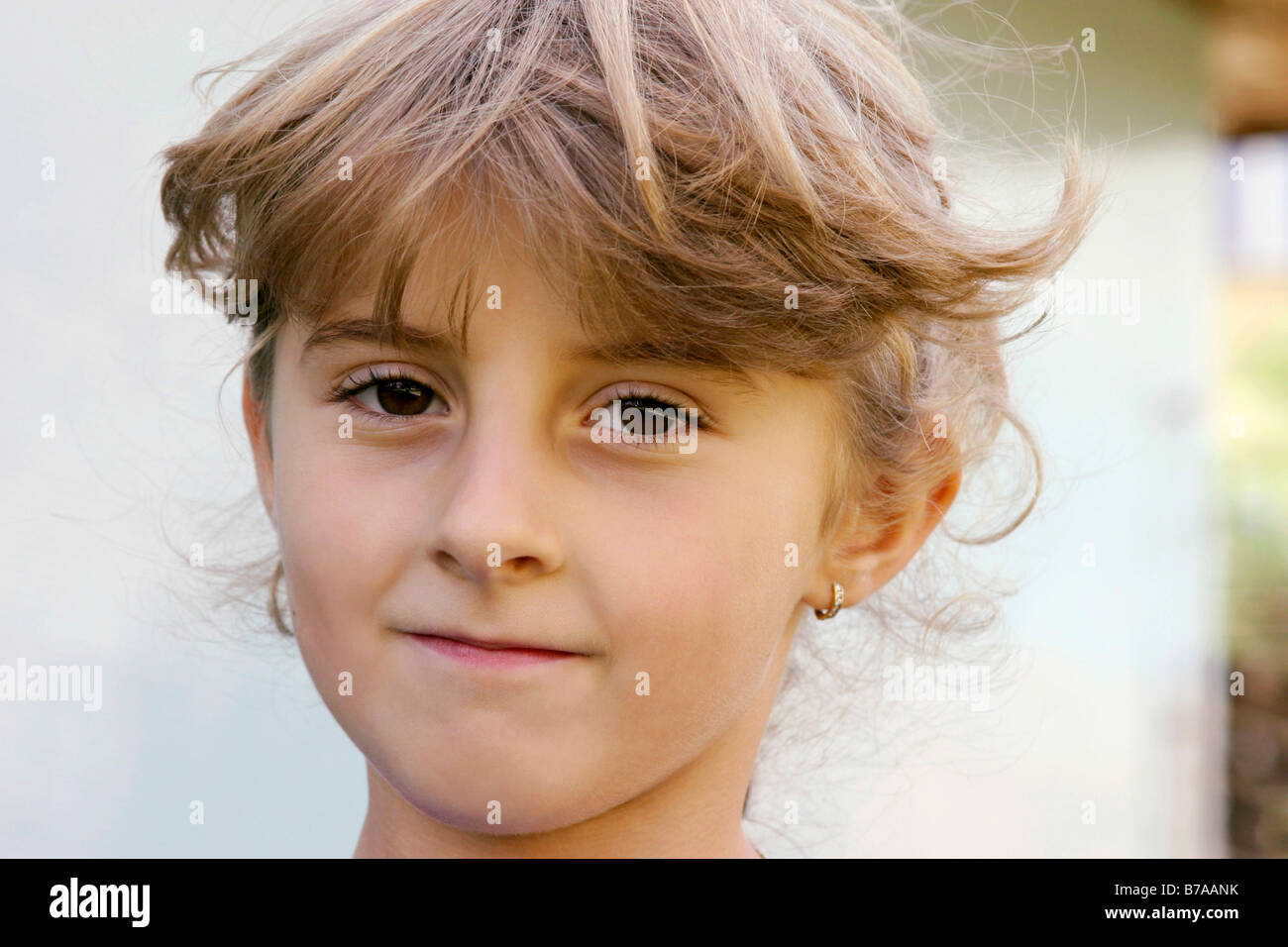 Young girl looking into camera Stock Photo