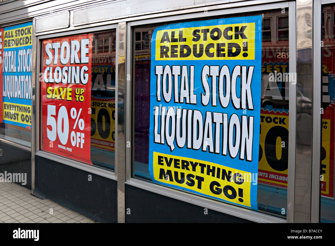 Stock liquidation posters in store window, Londond, UK Stock Photo