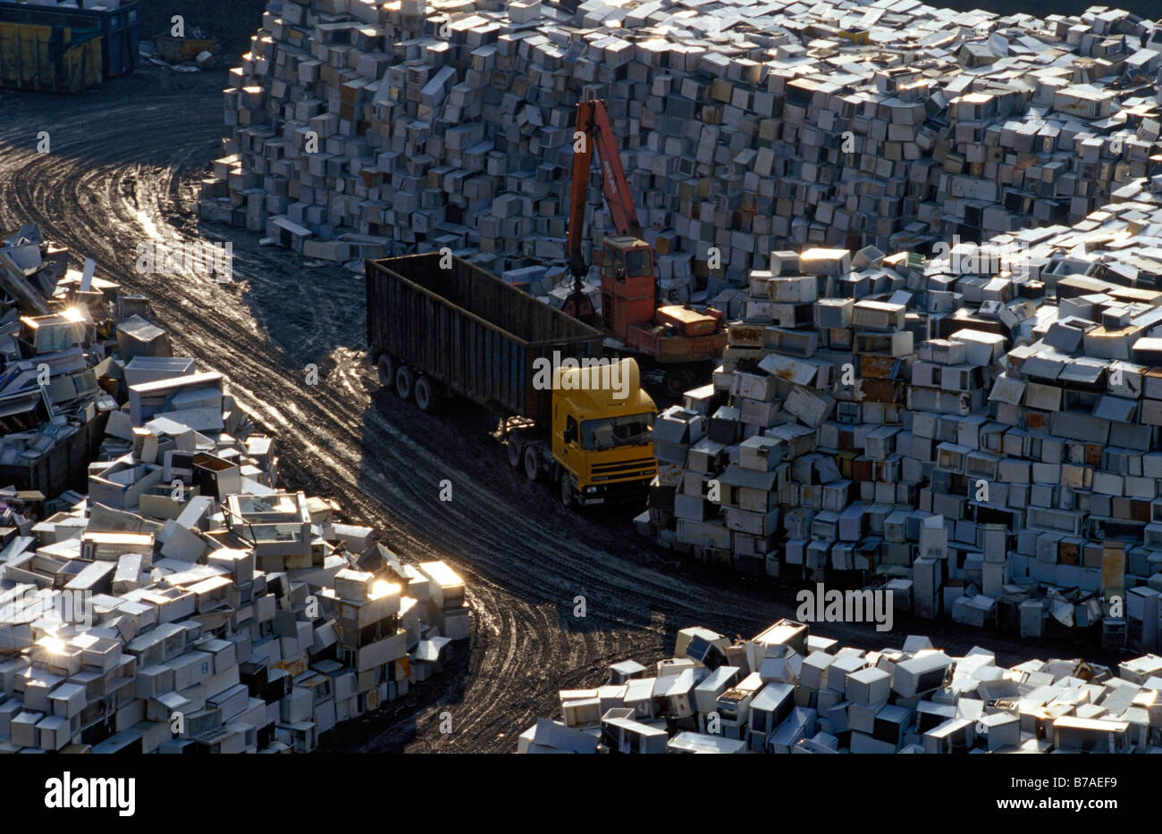 Old refrigerators, fridges await recycling at the temporary storage